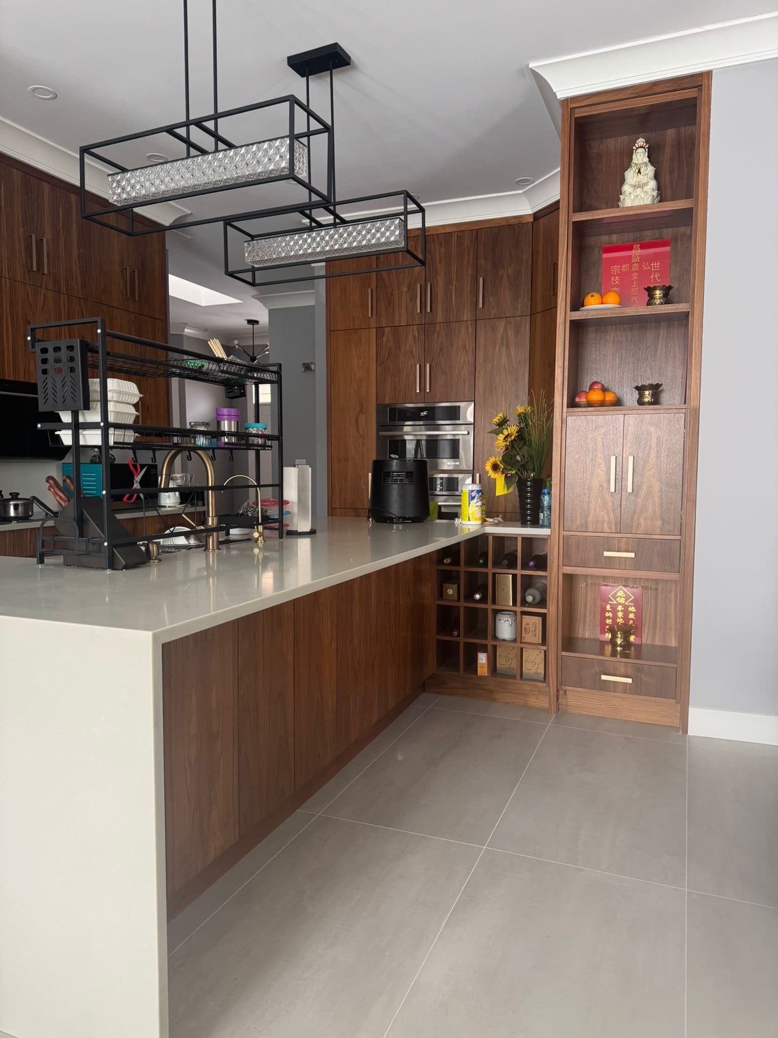 Custom white kitchen with shaker cabinets and large center island by YYC Cabinets Calgary