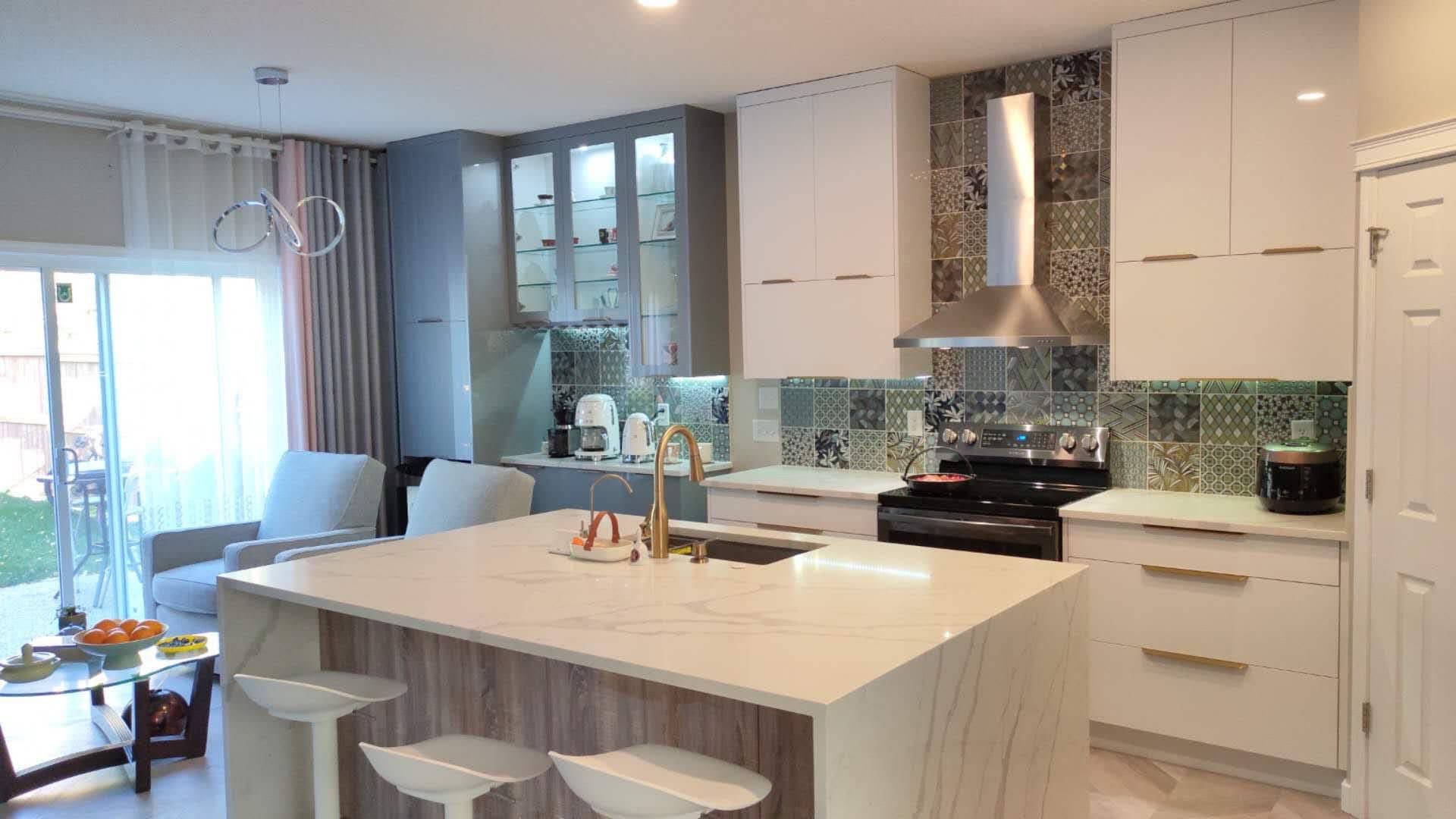 Modern custom kitchen with white and wood-tone cabinets by YYC Cabinets Calgary