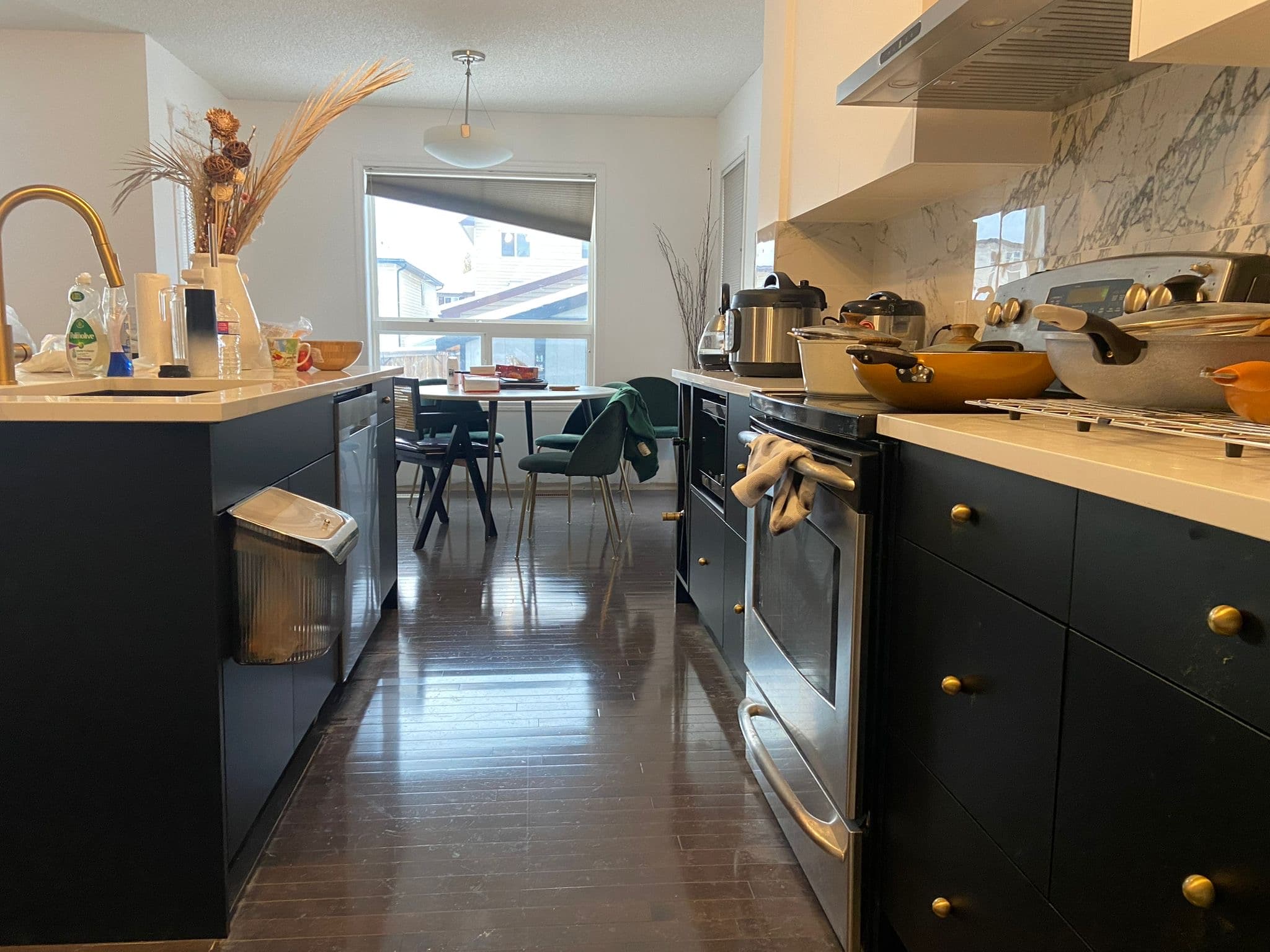 Custom entertainment unit with floating shelves and media console by YYC Cabinets Calgary